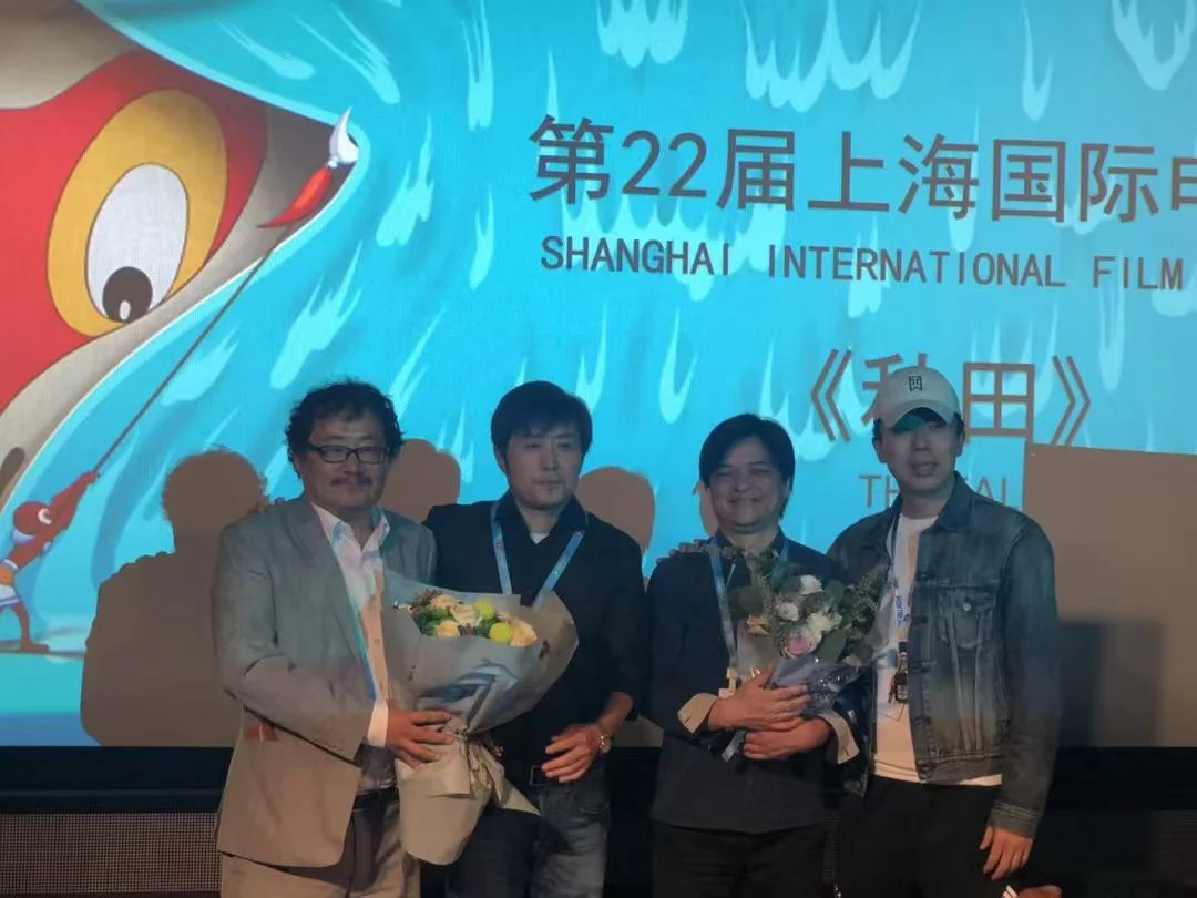 Greg Chen with director Zhou Lidong at the 22nd Shanghai International Film Festival for The Fall